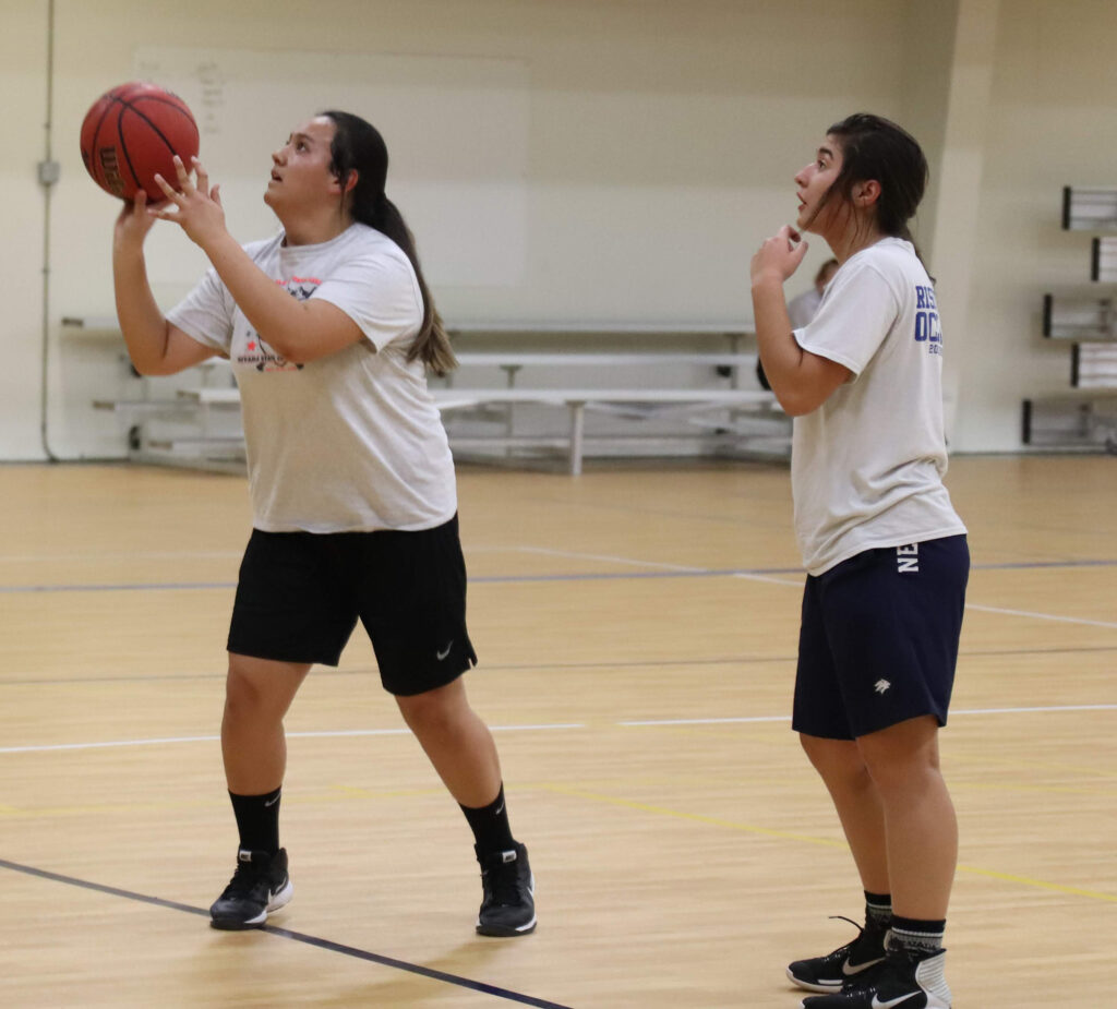 The freshman girls work on drills./Ron Espinola • The Brand