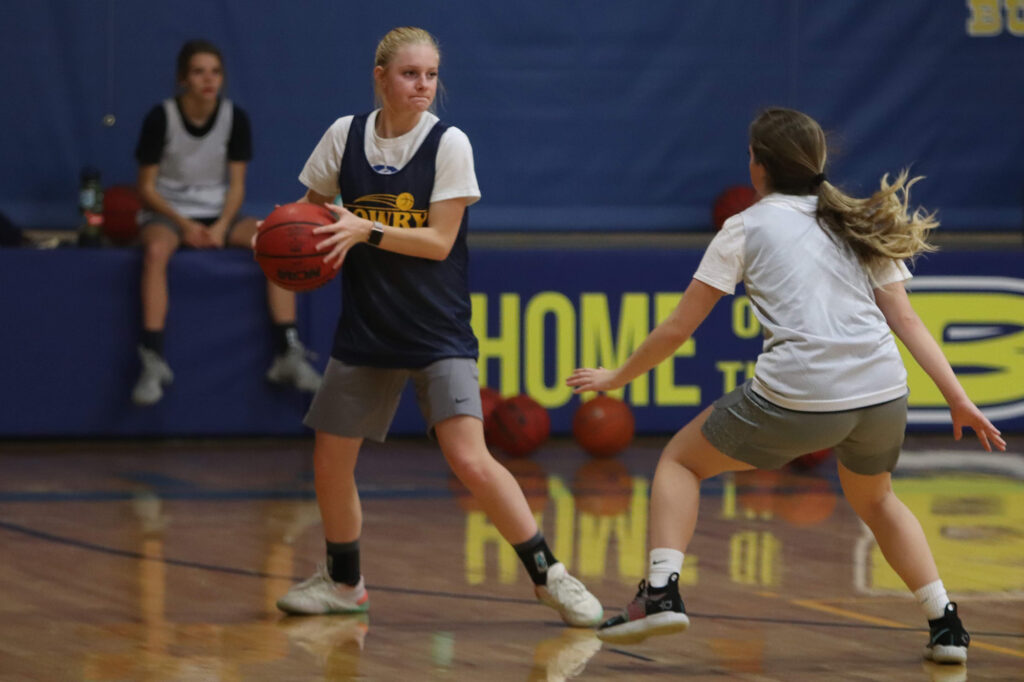 Carly Capellen defends against Bailee Brinkerhoff./Ron Espinola • The Brand