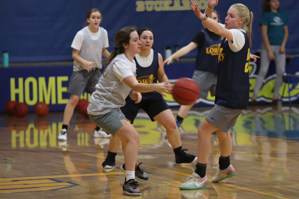 Bailee Brinkerhoff blocks Carly Capellen. /Ron Espinola • The Brand