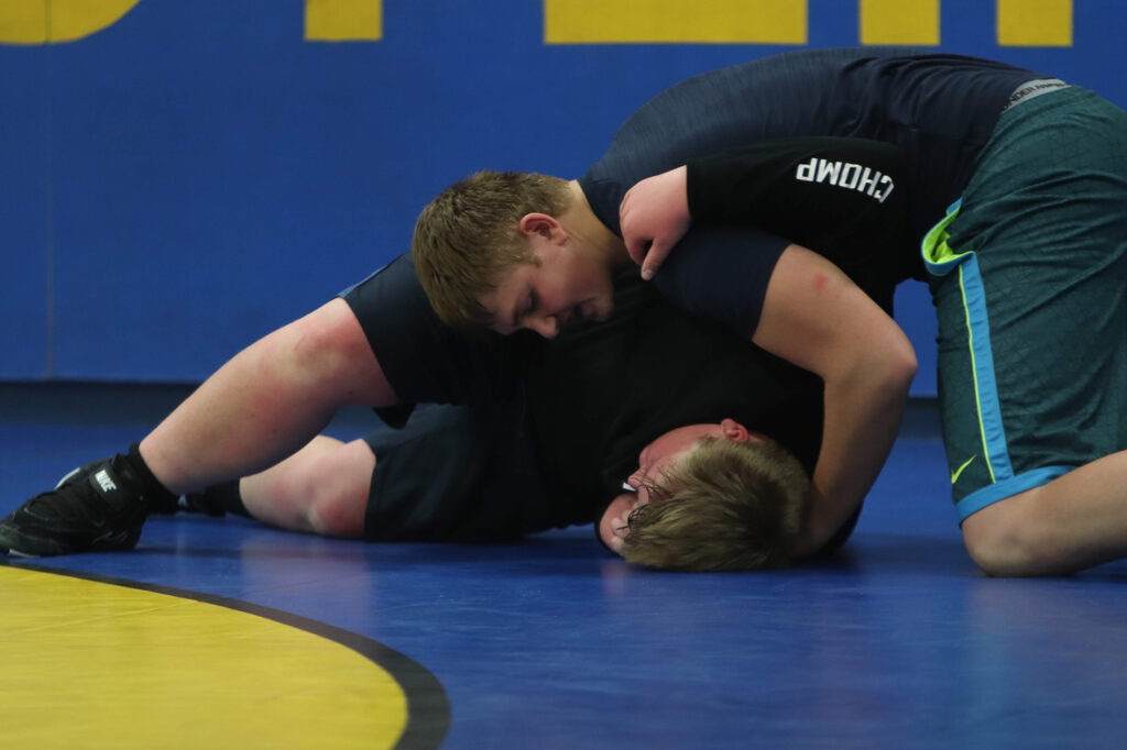  Kole Mattson takes down Jeremiah Simmons./Ron Espinola • The Brand