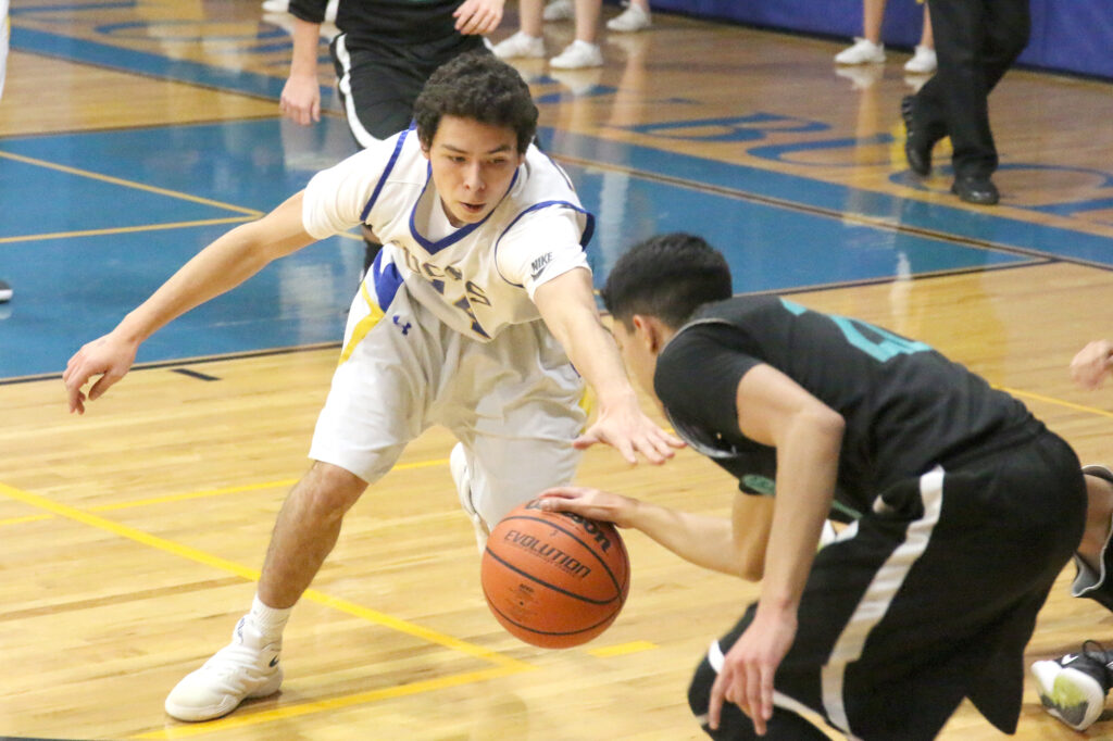 Alberto Medina steals the ball from North Valleys./Clarissa Olson • The Brand