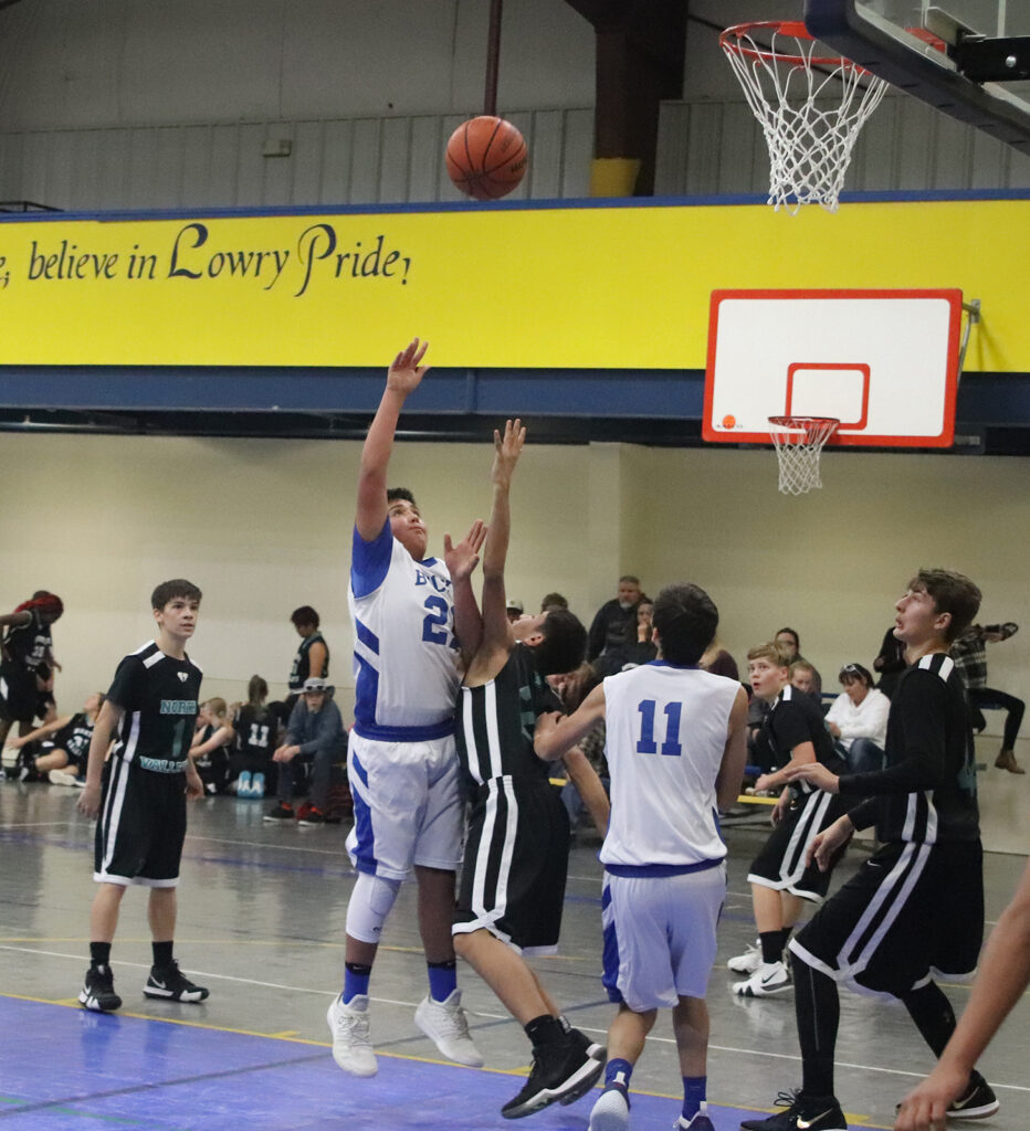 Wyatte Sakurada puts back a rebound for the score./Ron Espinola • The Brand