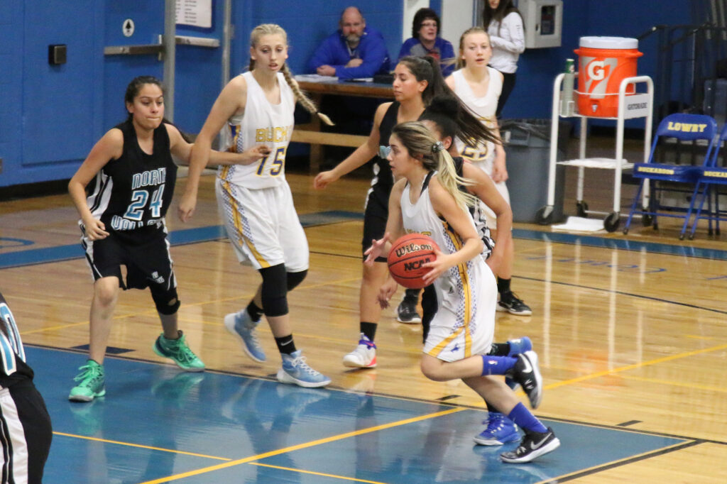 Shantel Bernal makes a drive for the hoop. /Clarissa Olson • The Brand