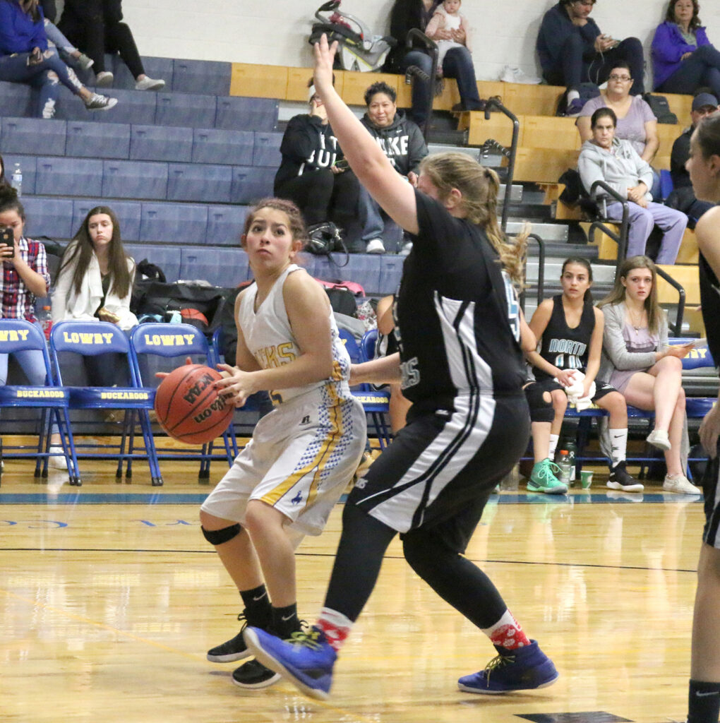 Alexus Gomez looks to shoot the ball./Clarissa Olson • The Brand