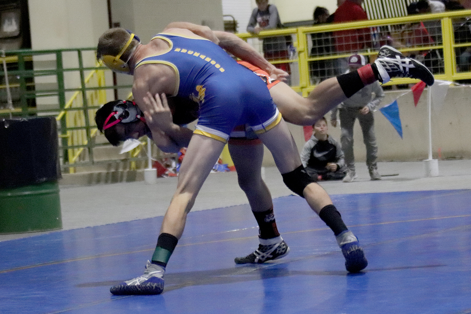 Caden Ricci  takes down opponent from Wells. /Ron Espinola • The Brand