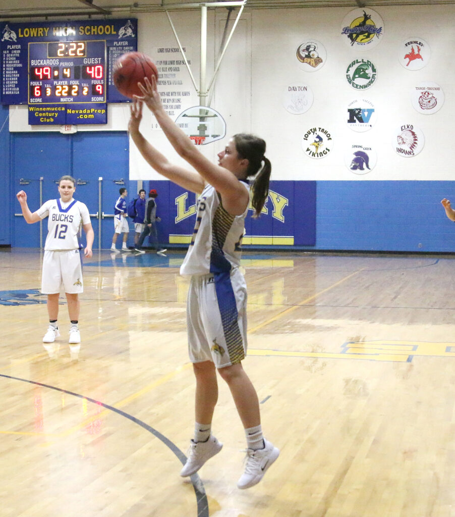 Rachel Garrison puts up a three-pointer./Ron Espinola • The Brand