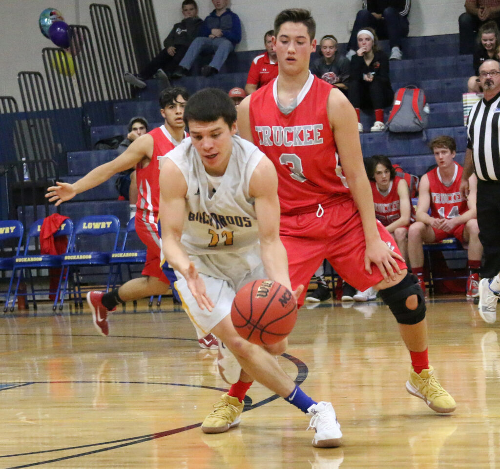 Oscar Juanes controls a loose ball. /Ron Espinola • The Brand