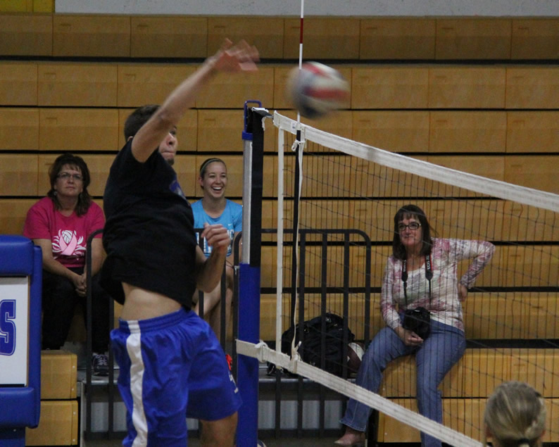 Omar Guerrero spikes the ball./Kaity Sample • The Brand