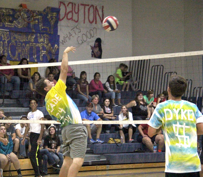 Cade Billingsley spikes the ball./Kimmy Claussen • The Brand