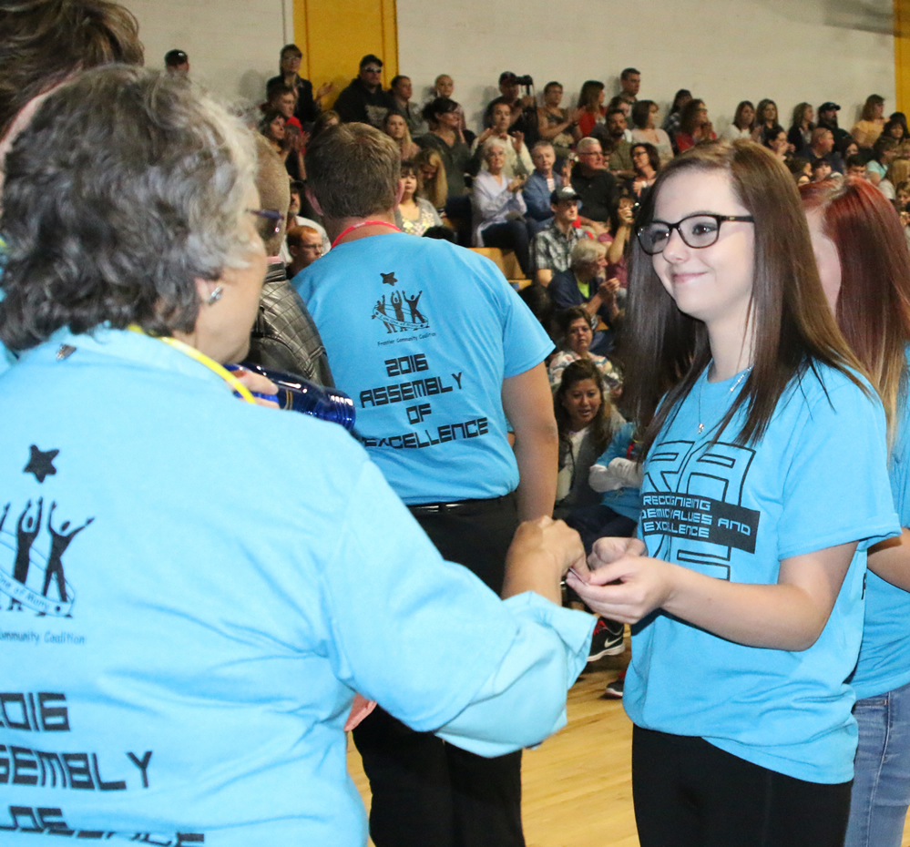 Abby Thacker receives an award./Ron Espinola • The Brand